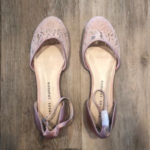 Ballet pink lace slip on flats with ankle strap.